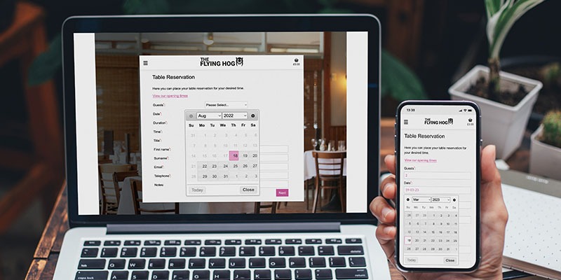 An individual is using a laptop and a smartphone, both equipped with EPOS software, to make a table reservation at The Flying Hog restaurant. The screens display a calendar interface with the chosen date. In the background, restaurant seating and a potted plant enhance the ambiance.