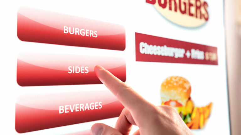 Self service and order kiosk in restaurant. Fast food touch screen, digital vending machine.
